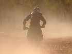 A motorcycle rider has died after crashing while competing in the off-road Finke Desert Race. 