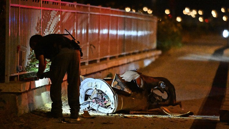 Israeli security forces examine a fragment of an intercepted Iranian missile in northern Israel.