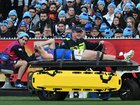 Brody Mihocek was stretchered off the MCG after fracturing his neck. (James Ross/AAP PHOTOS)