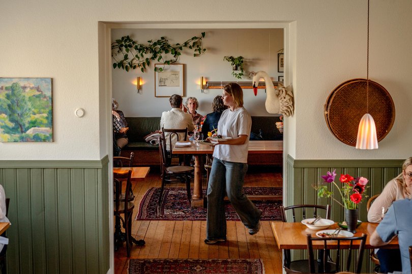Patrons at the Talldungen an inn and restaurant in Brosarp, Sweden.