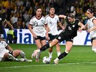 Australia's Alanna Kennedy swivels before scoring against Mexico in the friendly in Sydney. (Dan Himbrechts/AAP PHOTOS)