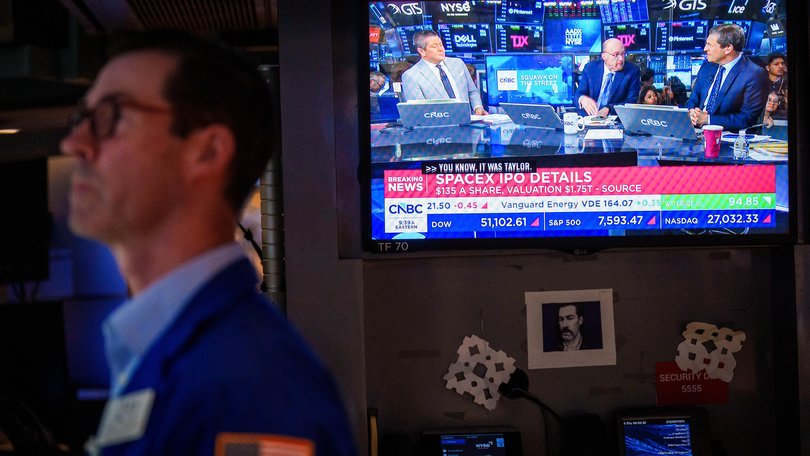 A television broadcasts SpaceX IPO news on the floor of the New York Stock Exchange.