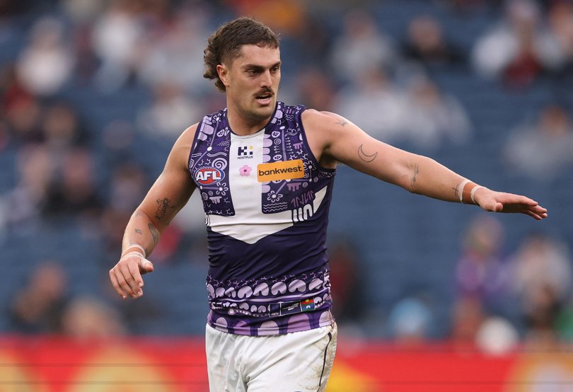 Luke Jackson of the Dockers celebrates after scoring a goal.