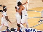 The Knicks celebrate their one-point win after staging a record comeback over the San Antonio Spurs. (AP PHOTO)