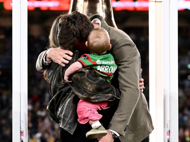 Jai Arrow rings the bell alongside partner Berina and daughter Ayla.