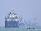 Vessels near the Strait of Hormuz may be able to start moving again through the energy corridor. (AP PHOTO)