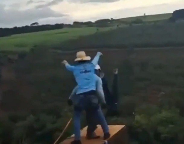 Staff throw her from the bridge.