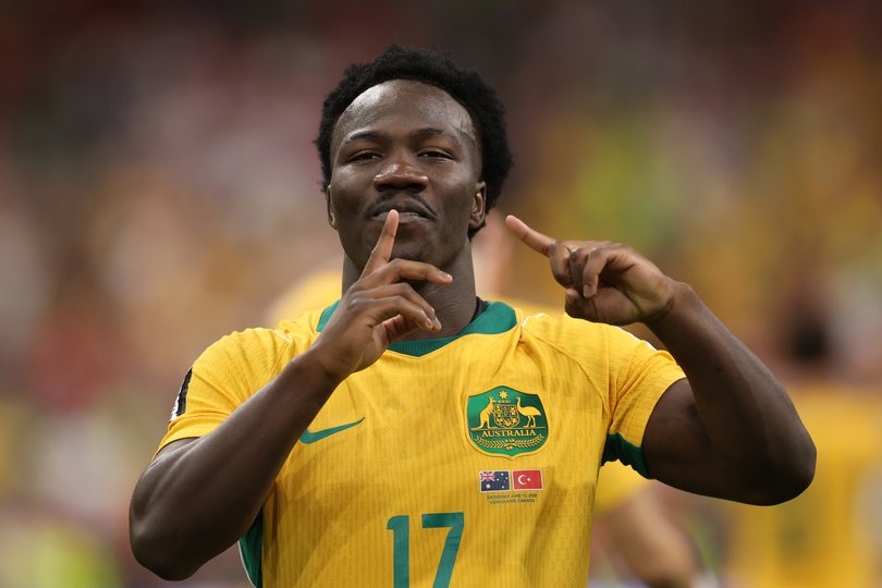Nestory Irankunda #17 of Australia celebrates scoring his team's first goal.