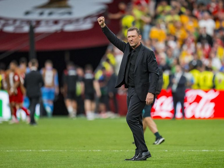 Tony Popovic earned high praise for engineering Australia's 2-0 World Cup win over Turkey. (EPA PHOTO)