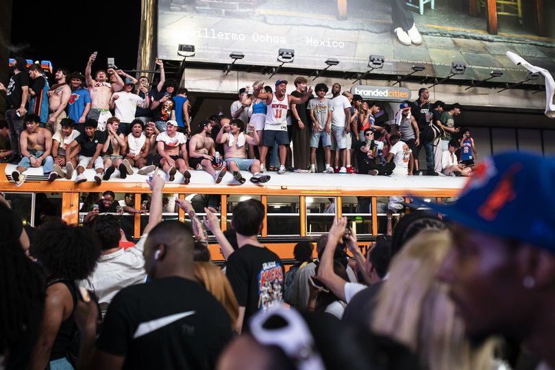 New York Knicks fans celebrate at Times Square in Manhattan.