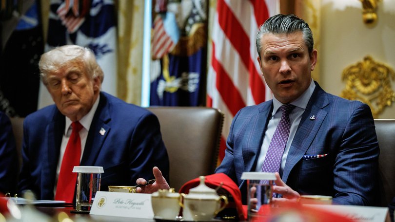 US President Donald Trump, left, and Pete Hegseth, US Secretary of War.
