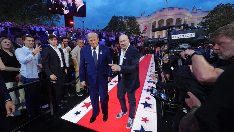 President Donald Trump and Dana White, UFC president and CEO, arrive for UFC Freedom 250 on the South Lawn of the White House, Sunday, June 14, 2026, in Washington. (AP Photo/Alex Brandon)