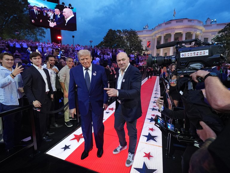 President Donald Trump and Dana White, UFC president and CEO, arrive for UFC Freedom 250 on the South Lawn of the White House, Sunday, June 14, 2026, in Washington. (AP Photo/Alex Brandon)