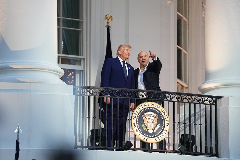 President Donald Trump, left, stands with Dana White, the president and CEO of the Ultimate Fighting Championship, on the Truman Balcony of the White House.