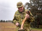 Major Mark Prideaux from Army Headquarters prepares a Boondi during Exercise Greenskin in Canberra.