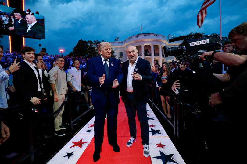 U.S. President Donald Trump arrives with UFC CEO Dana White for UFC Freedom 250 on the South Lawn of the White House in Washington, D.C., U.S., June 14, 2026. REUTERS/ Evan Vucci