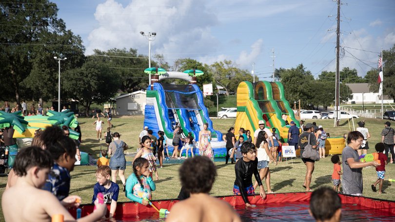 Children attend the Bastrop Splash Bash at Fisherman's Park.