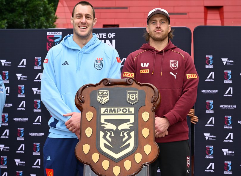 NSW Blues captain Isaah Yeo and Queensland Maroons captain Cameron Munster.