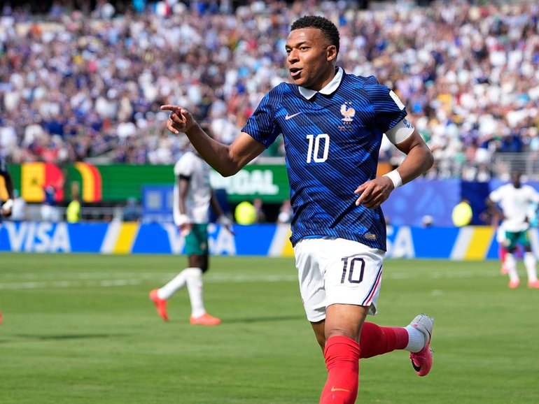 A second-half Kylian Mbappe brace has steered France to an opening World Cup win over Senegal. (AP PHOTO)