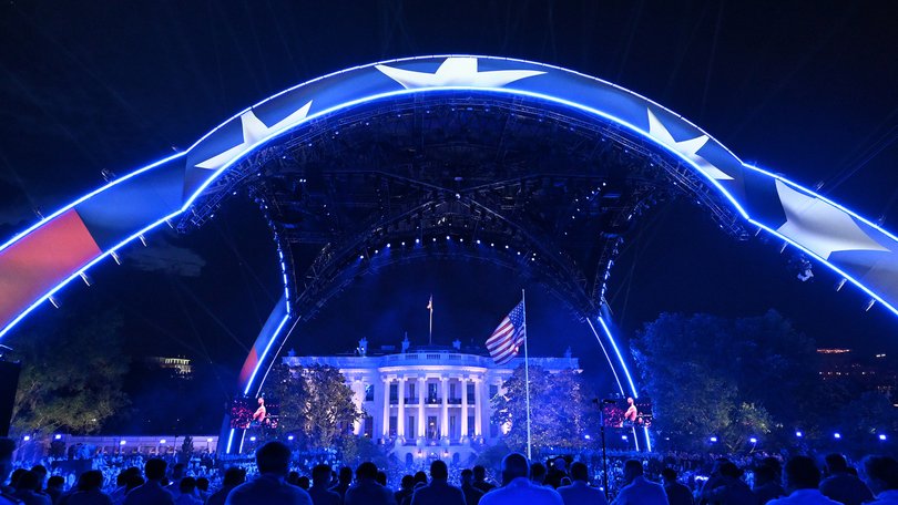 Spectators fill the South Lawn of the White House in Washington during a UFC event hosted by President Donald Trump for his 80th birthday, on Sunday