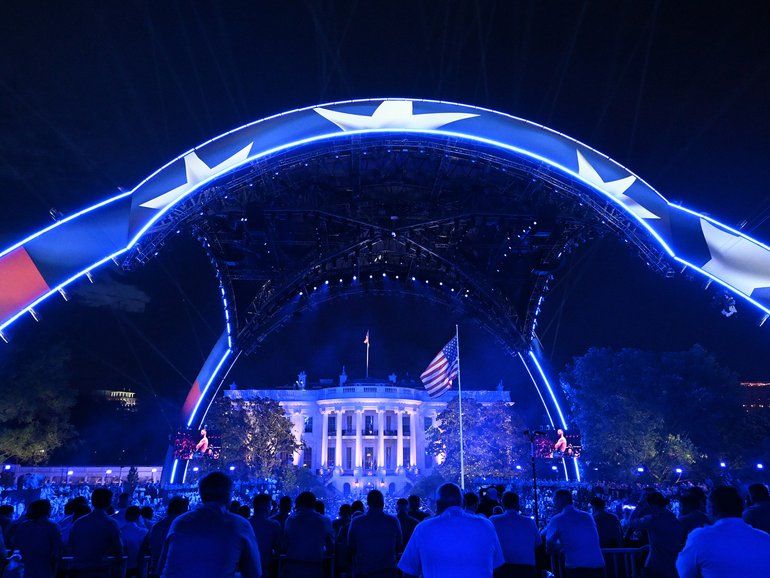 Spectators fill the South Lawn of the White House in Washington during a UFC event hosted by President Donald Trump for his 80th birthday, on Sunday