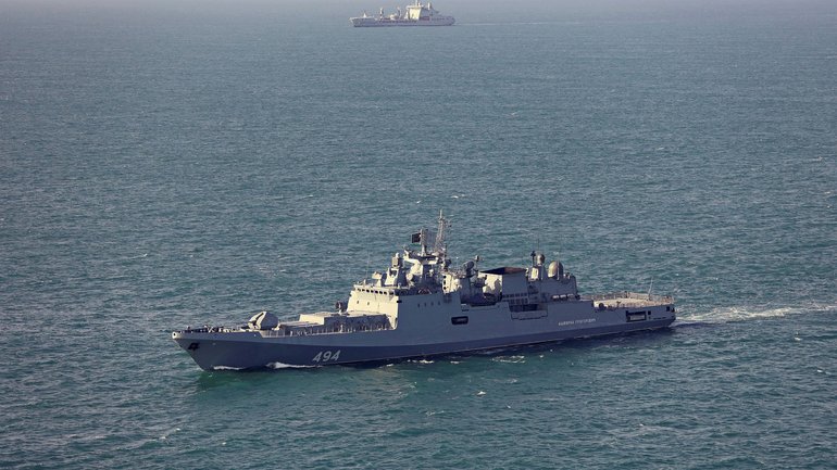 The Russian frigate Admiral Grigorovich (foreground) is monitored by the Royal Navy's RFA Tideforce (background). The Admiral Grigorovich reportedly fired warning shots at a UK-registered yacht on Tuesday.