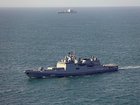 The Russian frigate Admiral Grigorovich (foreground) is monitored by the Royal Navy's RFA Tideforce (background). The Admiral Grigorovich reportedly fired warning shots at a UK-registered yacht on Tuesday.