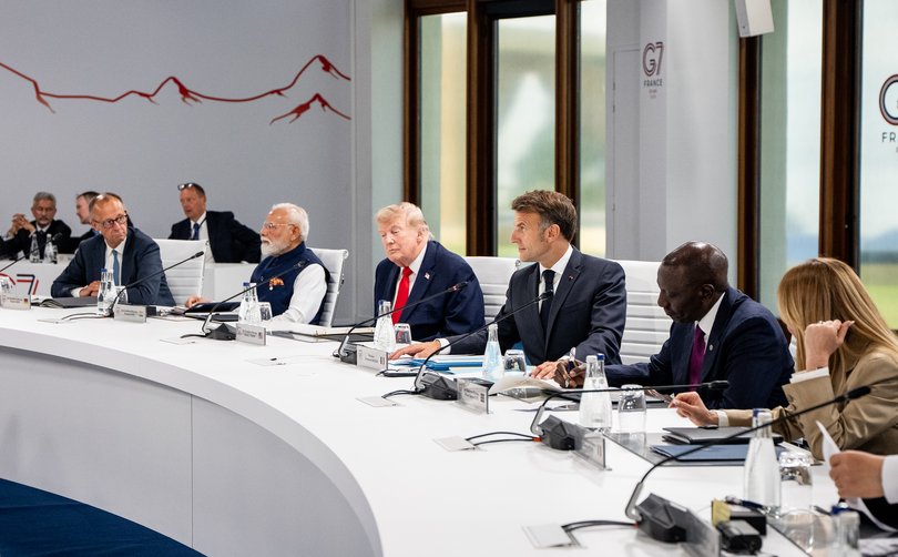 President Donald Trump, center, attends a working session with other world leaders during the G7 Summit in Evian-les-Bains, France, June 16, 2026.