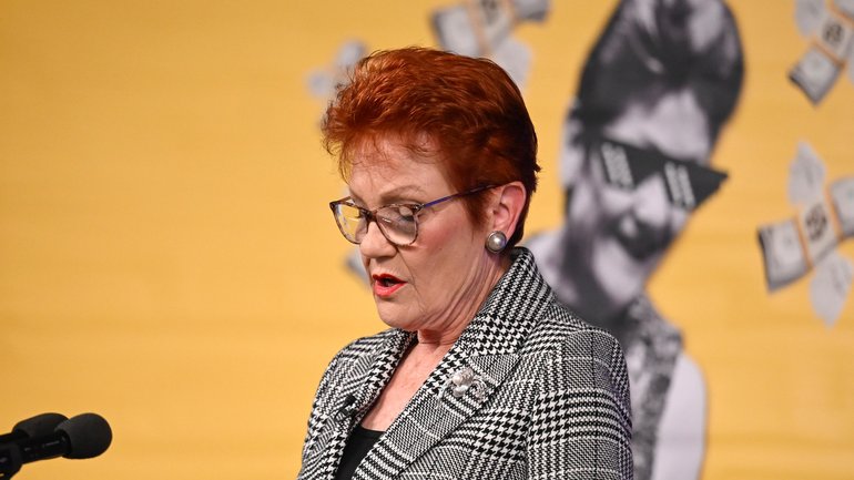 Pauline Hanson’s address to the National Press Club of Australia in Canberra was interrupted by a protest banner. 