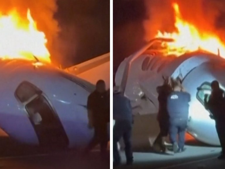 Heroic bystanders can be seen racing to the burning wreckage of a plane crash on a US highway in a bid to free passengers trapped inside.