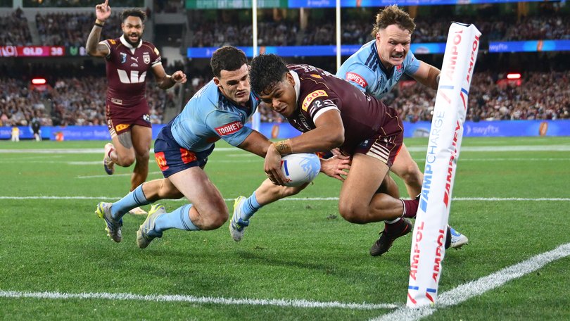 Selwyn Cobbo of the Maroons scores a try during game two of the Men's State of Origin series.
