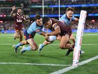 Selwyn Cobbo of the Maroons scores a try during game two of the Men's State of Origin series.
