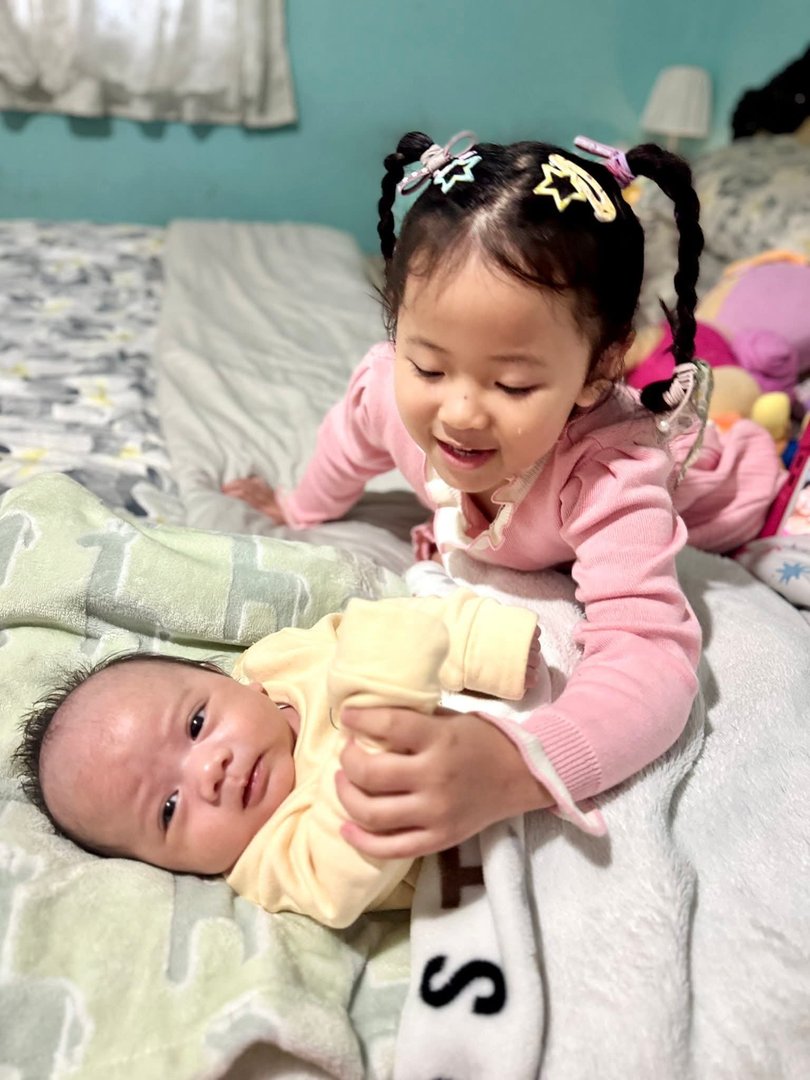 Katherine and Harry were hit by a car while crossing the road with their mother.