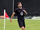 Christian Pulisic of the United States participates away from other players during a training session.