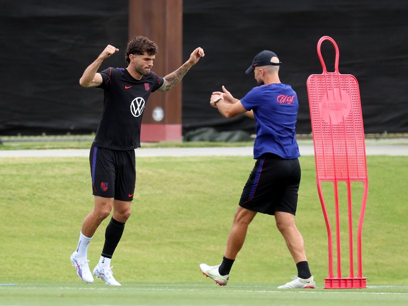 Christian Pulisic of the United States participates away from other players during a training session.