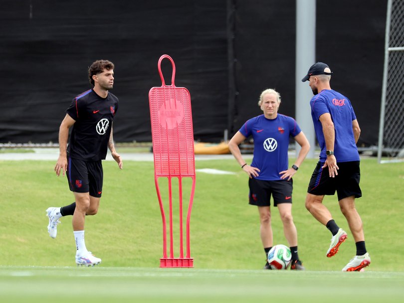 Christian Pulisic of the United States participates away from other players during a training session.