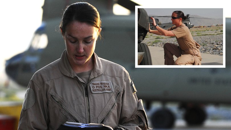 Captain Naomi Rogusz, aircraft captain for a combat resupply mission in southern Afghanistan, briefs the crews of two Australian CH-47D Chinook medium lift helicopters (MLH) prior to departure.