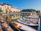 Australians heading to Europe and beyond are being urged to reassess travel plans and insurance cover, after the Federal Government downgraded its travel advice.