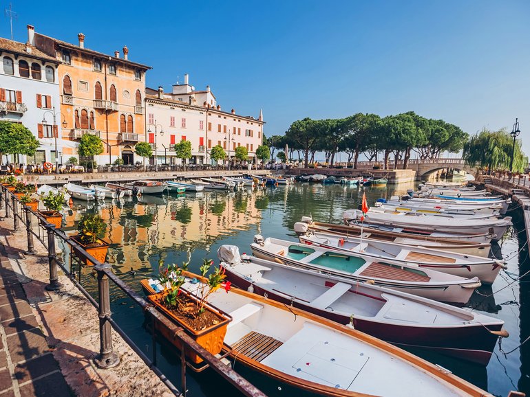 Australians heading to Europe and beyond are being urged to reassess travel plans and insurance cover, after the Federal Government downgraded its travel advice.