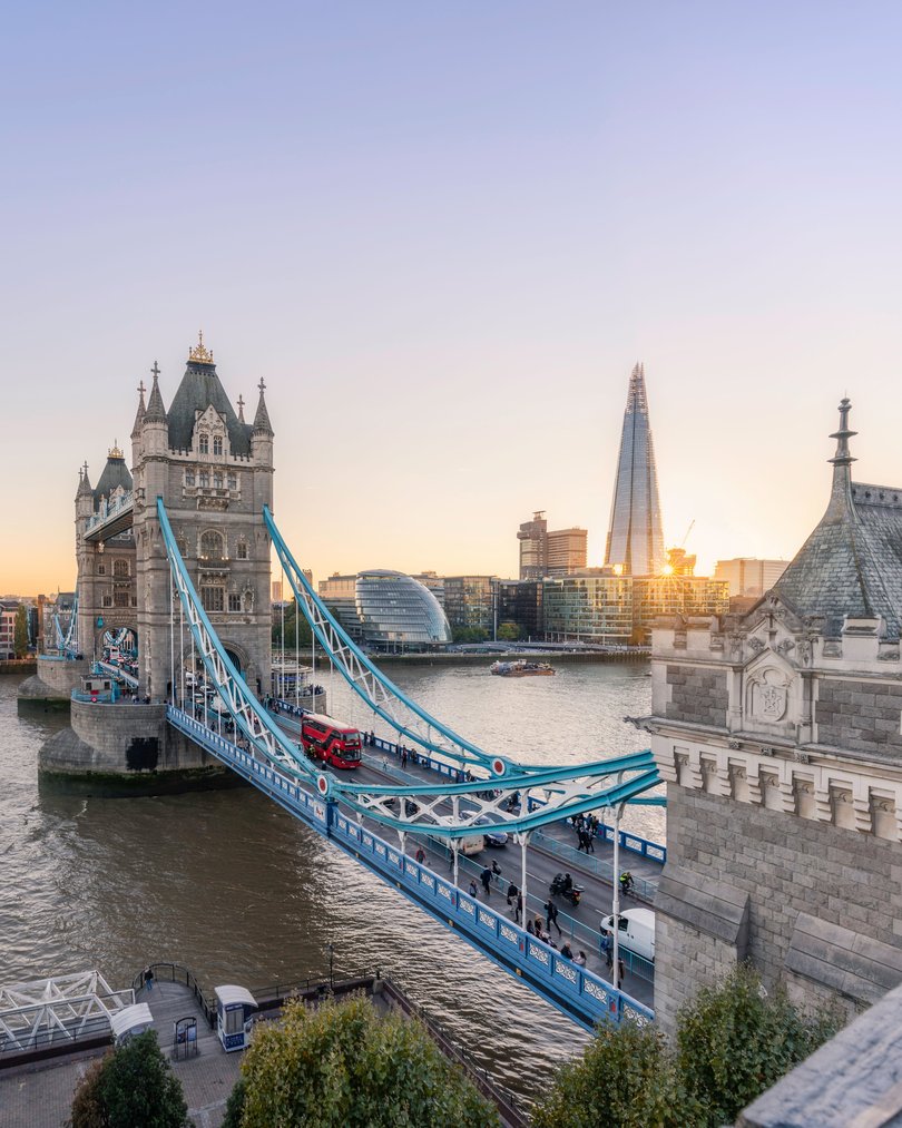 Tower Bridge over the river Thames with modern buildings including the Shard and City Hall on the far side of the river