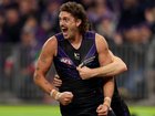 Fremantle have extended their club-record winning streak to 13 games by beating Geelong.