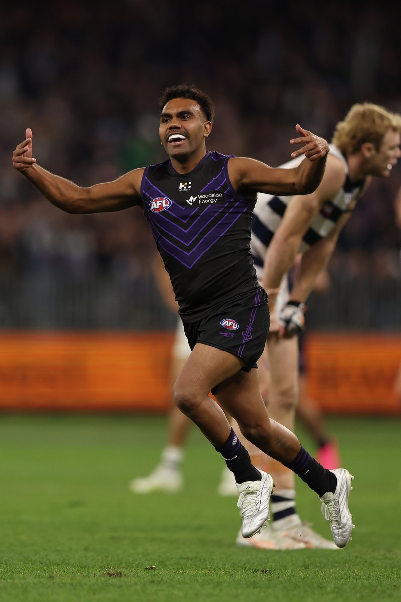 PERTH, AUSTRALIA - JUNE 18: Isaiah Dudley of the Dockers celebrates a goal during the round 15 AFL match between Fremantle Dockers and Geelong Cats at Optus Stadium, on June 18, 2026, in Perth, Australia. (Photo by Janelle St Pierre/AFL Photos)