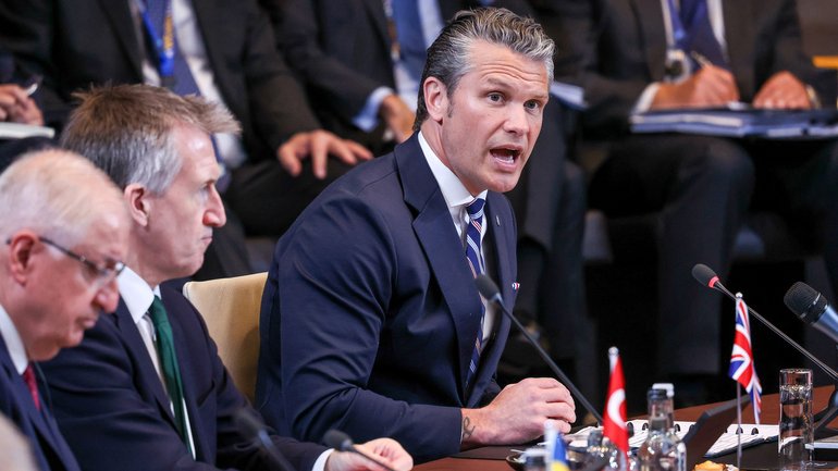 US Secretary of Defence Pete Hegseth, right, addresses the North Atlantic Council meeting of Defence Ministers during the NATO defence ministers' meeting in Brussels, Belgium. 