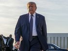 Donald Trump lashes out at critics as markets hit record highs.