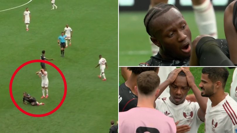 Canada’s Ismael Kone was injured in a tackle by Qatar’s Assim Madibo.