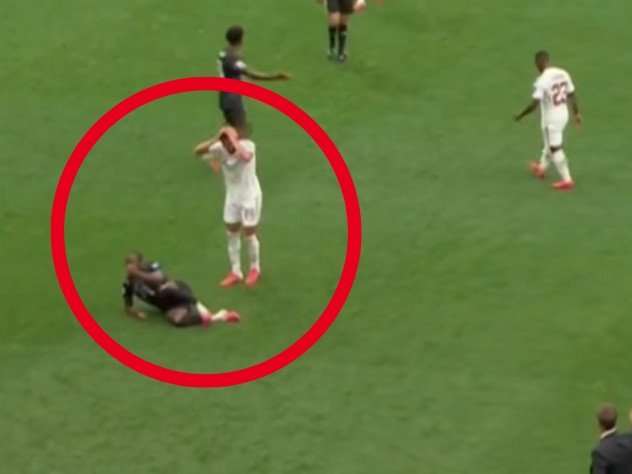 Canada’s Ismael Kone was injured in a tackle by Qatar’s Assim Madibo.
