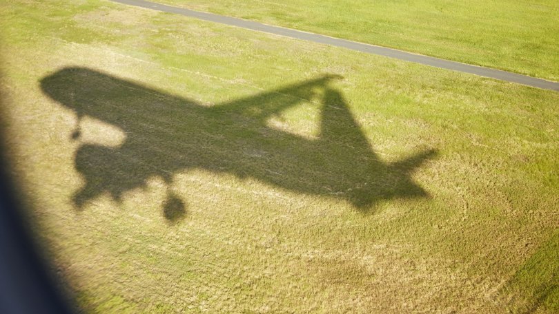 The body of a man has been found inside the landing gear of a plane at a London airport.
