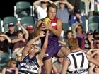 11 Mar 2000:  Tony Modra #6 for Fremantle Dockers takes a high mark over the pack in the match between the Dockers and the Geelong Cats during round one of the AFL season, played at Subiaco Oval in Perth, Australia. 