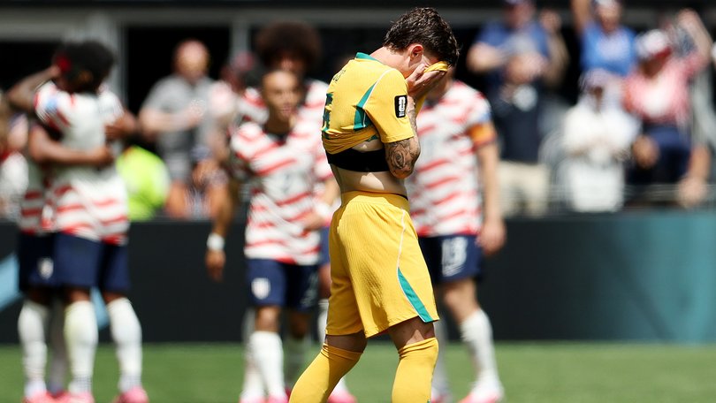 Jordan Bos #5 of Australia reacts after the second goal of the United States.