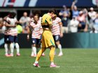 Jordan Bos #5 of Australia reacts after the second goal of the United States.